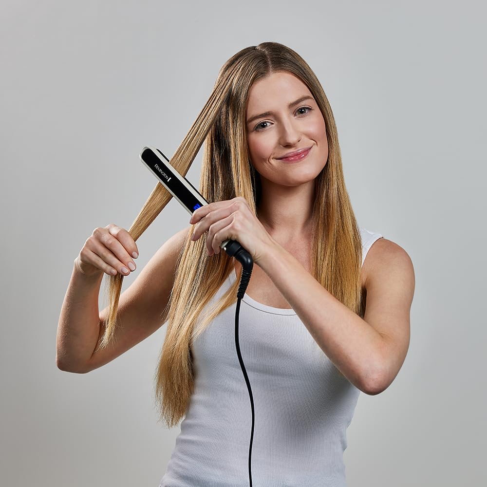 Remington Glätteisen [Testsieger] Pearl (hochwertige Keramikbeschichtung mit echten Perlen für eine gleichmäßige Wärmeverteilung) LCD-Display, 150-235°C, inkl. Aufbewahrungstasche, Haarglätter S9501