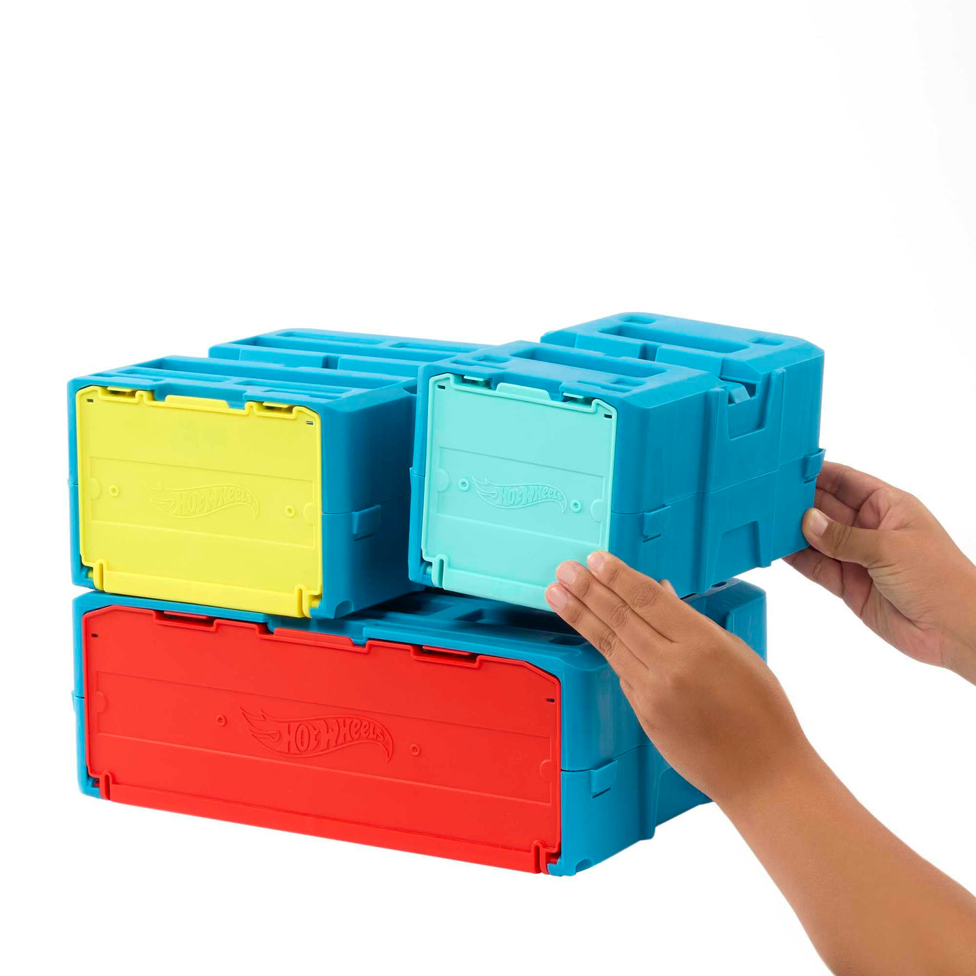 Hot Wheels Trackset, Trackset im Feuer-Design mit einem Hot Wheels Fahrzeug, 16 Track- und Stuntkomponenten in stapelbarer Spielzeug-Aufbewahrungsbox, HMC04