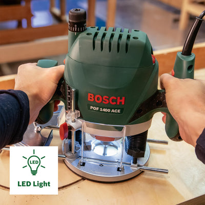 Bosch Oberfräse POF 1400 ACE (1400 W; für Holzbearbeitung; 3x Spannzange; Fräser; Parallelanschlag; Absaugadapter; im Koffer), Testnote: Testsieger (Magazin: selbst ist der Mann)