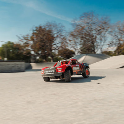 ARRMA Mojave Grom Ferngesteuertes Auto, RC Auto 1/18, Brushless Motor über 30 km/h, inkl. Akku und Zubehör, Rot-Schwarz, ARA2104T1