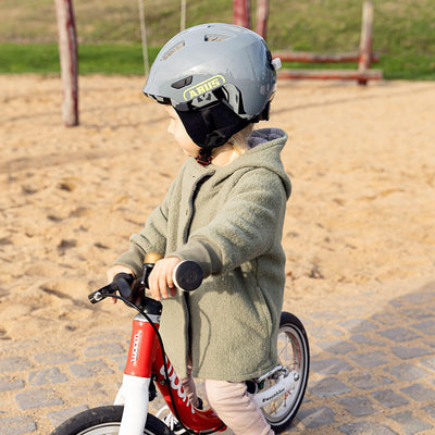 ABUS Winter Kit Smiley für Kinder-Fahrradhelme – Helmmütze mit Ohrenschützern für den Kinderhelm Smiley – schützt vor Kälte und Wind – Schwarz, Größe S