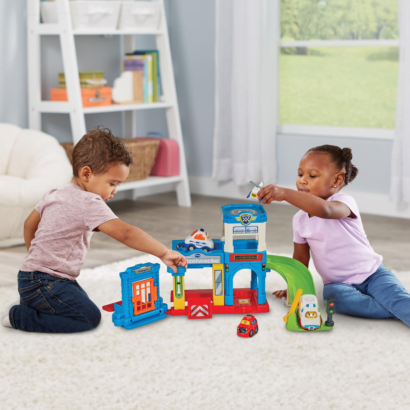 VTech Baby TUT TUT Baby Flitzer - Polizeiwache – Interaktives Spielset mit Polizeiauto, Musik, spannenden Sätzen und Geräuschen – Für Kinder von 1-5 Jahren