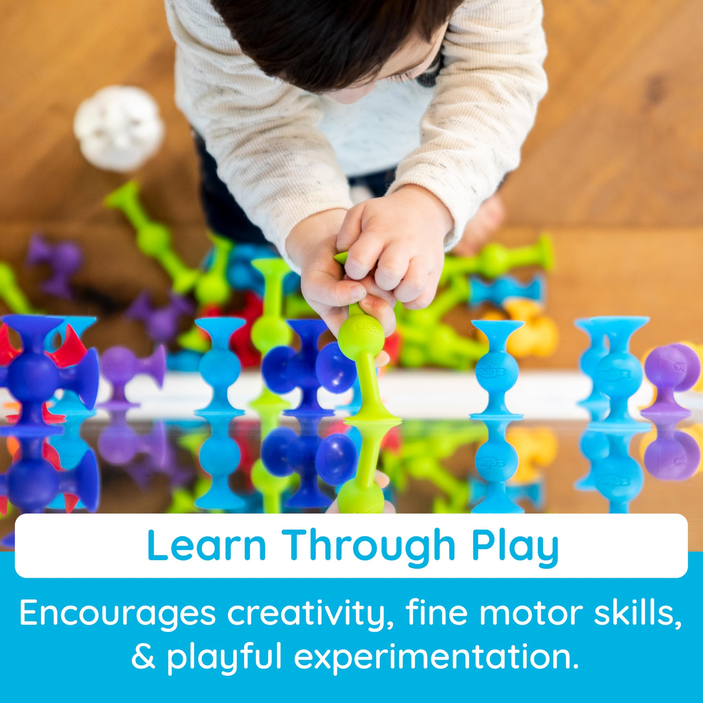 Fat Brain Squigz Starter 22-teiliges Set, Vorschulspielzeug für Kinder, Saugspielzeug-Set, Sortier- und Stapelspielzeug, Vorschul-Badespielzeug, innovatives Spielzeug für Kinder ab 3 Jahren und älter.