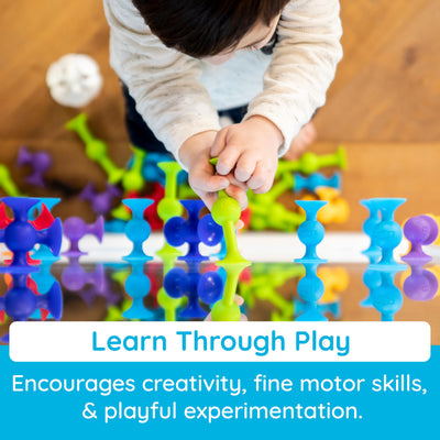 Fat Brain Squigz Starter 22-teiliges Set, Vorschulspielzeug für Kinder, Saugspielzeug-Set, Sortier- und Stapelspielzeug, Vorschul-Badespielzeug, innovatives Spielzeug für Kinder ab 3 Jahren und älter.