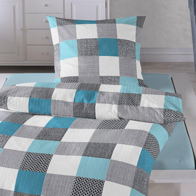 Traumschlaf Seersucker Bettwäsche Set • luftig leichte Sommerbettwäsche im Quadrate Design bügelfrei mit Reißverschluss • 135x200 cm + 80x80 cm