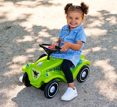 Big Bobby Car Classic Dino - Rutschauto ab 1 Jahr im bunten Dino-Design mit schwarzem Sicherheits-Lenkrad und Hupe, für Kinder ab 12 Monaten (bis 50 kg), grün mit Aufklebern